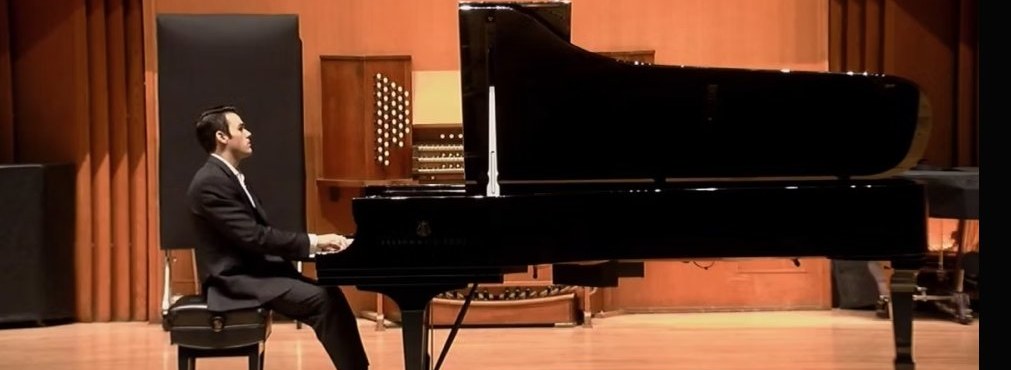 Kacey Grieco at the piano, performing Bach