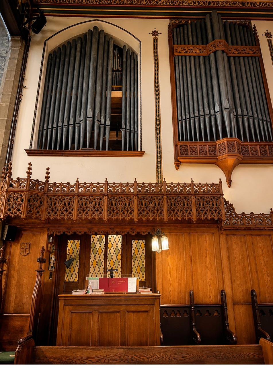 The carved Gothic façades of the organ pipework at St. James'